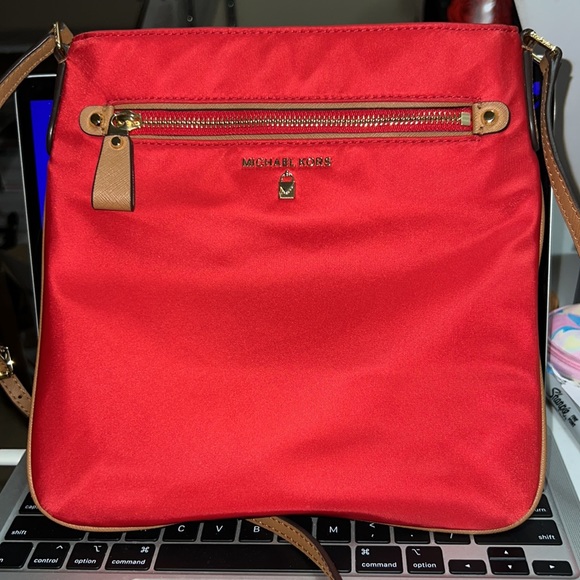 Michael Kors Handbags - NWOT Red and gold MICHAEL KORS adorable 🥰 Nylon Crossbody with care card